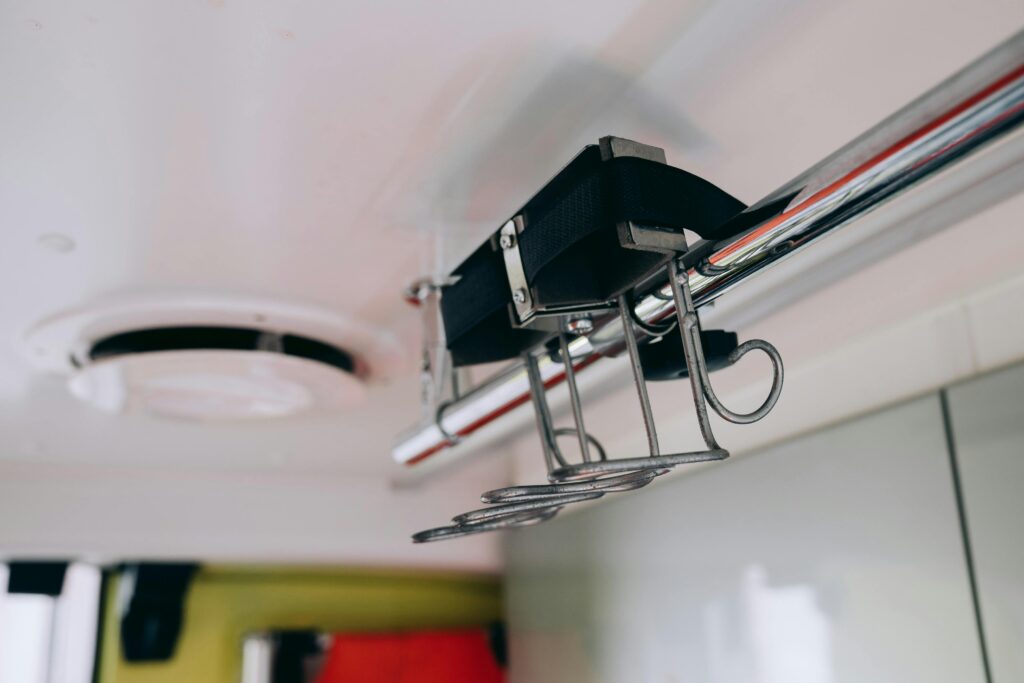 Close-up of medical equipment inside an ambulance, highlighting details and functionality.